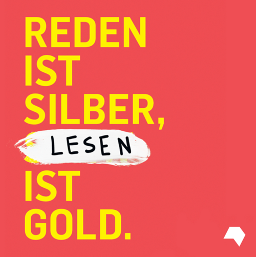 Download: Gelde Schrift auf rotem Hintergrund: Reden ist Silber, Lesen ist Gold.