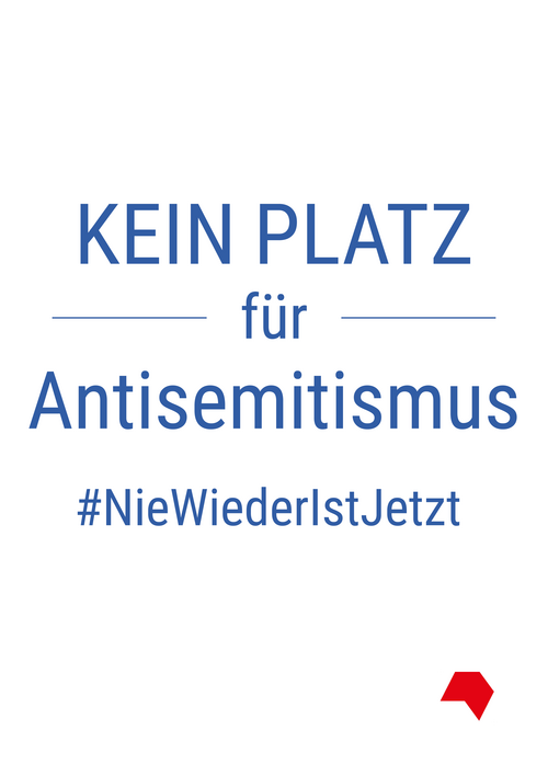Blauer Text auf weißem Hintergrund: Kein Platz für Antisemitismus #NieWiederIstJetzt